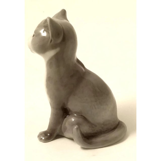 B & G Copenhagen Cat Figurine, #2515, Denmark. The Grey and White Cat with its innocent inquisitive gaze stands 5 inches...