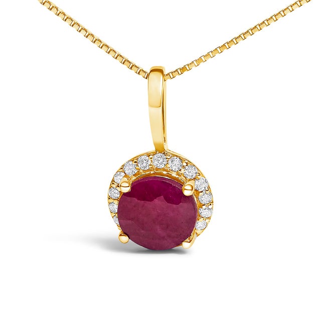 Adorn your neckline with the exquisite allure of this 10K yellow gold pendant necklace, where the warmth of the metal...