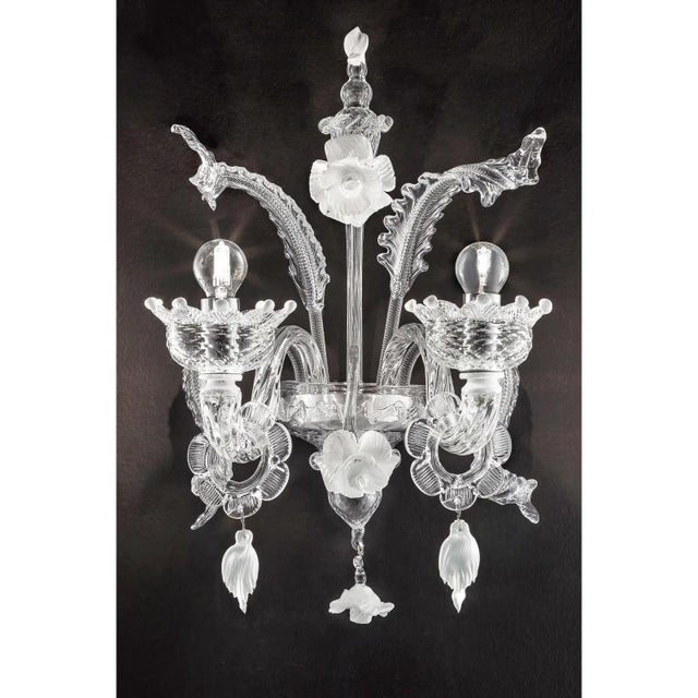 Venetian floreal murano glass chandelier with transparent leaves and flowers pinched by hand full of precious white...