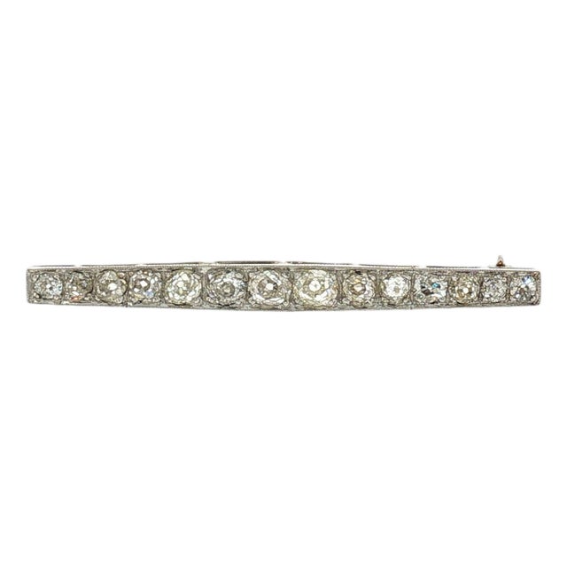 Early 20th Century Edwardian Platinum 14 Old Mine Cut Diamond Bar Brooch For Sale
