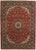 Antique hand-knotted Persian Mashad wool rug with a red field featuring a large central medallion and dense floral motifs,...