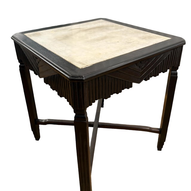 This elegant square table is a classic example of the "Old Shanghai" style from the early 20th century. It represents a...