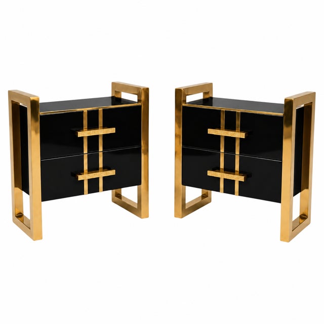 Black glass and polished brass give this pair of Italian bedside tables a graphic, high-contrast character. Handcrafted to...