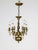 A 19th century Dutch chandelier with Renaissance Revival flame accents. A rich patina on a solid brass, turned-style form...