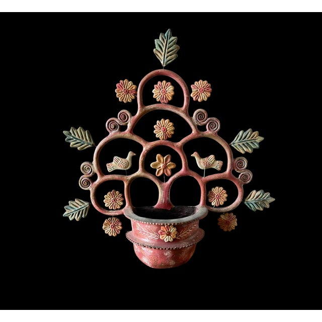 Sourced from a 1960's time capsule of a home in San Diego, this Mexican Tree of Life wall pocket is a piece of sculptural...