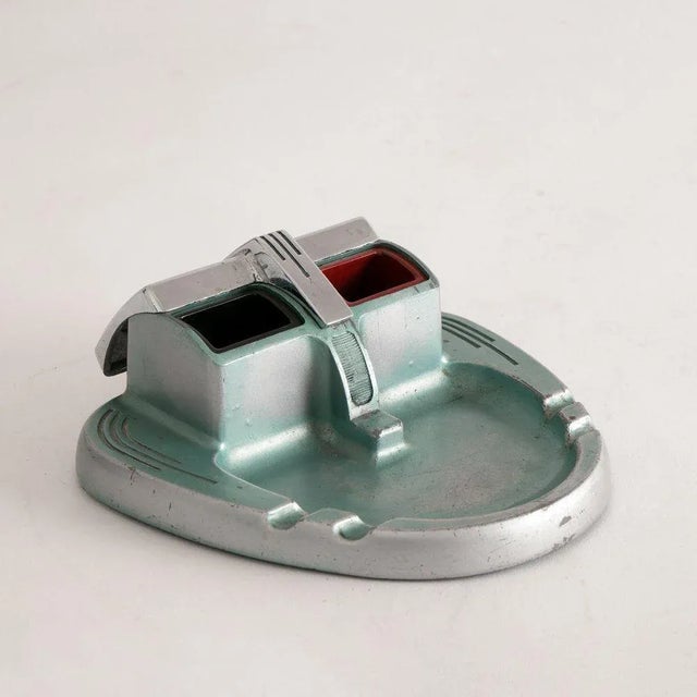 H: 5.5cm w: 16.5cm d: 15.5cm a british art deco joseph lucas chrome and anodised steel cigarette tray.