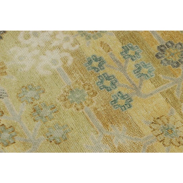 Made with a luxurious hand-knotted silk, this 4x5 modern rug is a regal, exceptional addition to Rug & Kilim’s Modern...