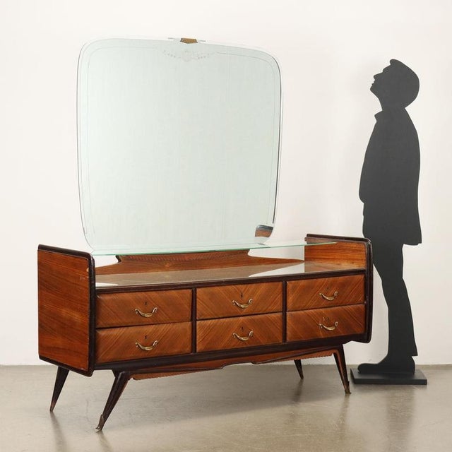Dresser with mirror, exotic wood veneer, back-treated glass top, and transparent glass shelf (with chipping), brass...