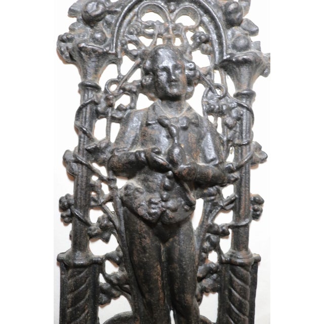 Up for sale is a wonderful antique figural cast iron relief wall plaque. It's made of very thick black painted iron, is a...