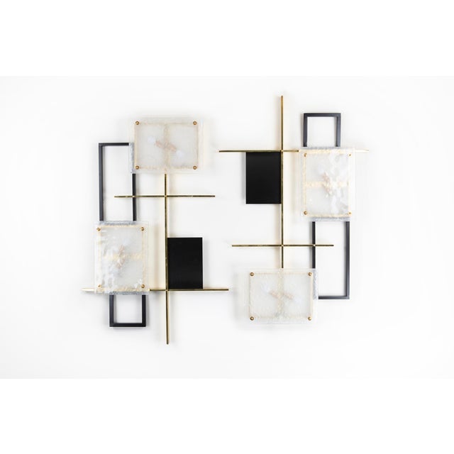 Two large brass and glass wall lamps, Italy, 1985 European Plug (up to 250V).The wiring of this item may be original and...