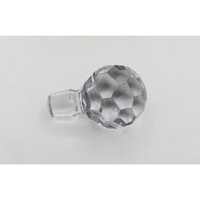 English cut corner square decanter with stopper, circa 1900. Diamond faceted ball stopper. Fully decorated side panels. 4"...