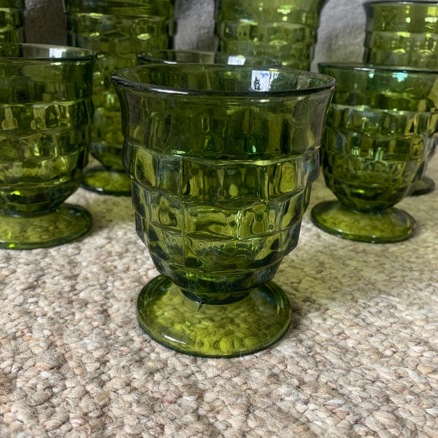 Enhance your drinkware collection with this stunning set of seven vintage green tumbler glasses. The glasses are perfect...