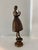 Mid-Century Modern Cast Metal Female Sculpture | European, Circa 1960 An exceptionally sculptural mid-century European...