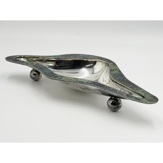 An exceptional free-form Modernist centerpiece bowl designed and handcrafted by Los Castillo in Taxco, Mexico, one of the...