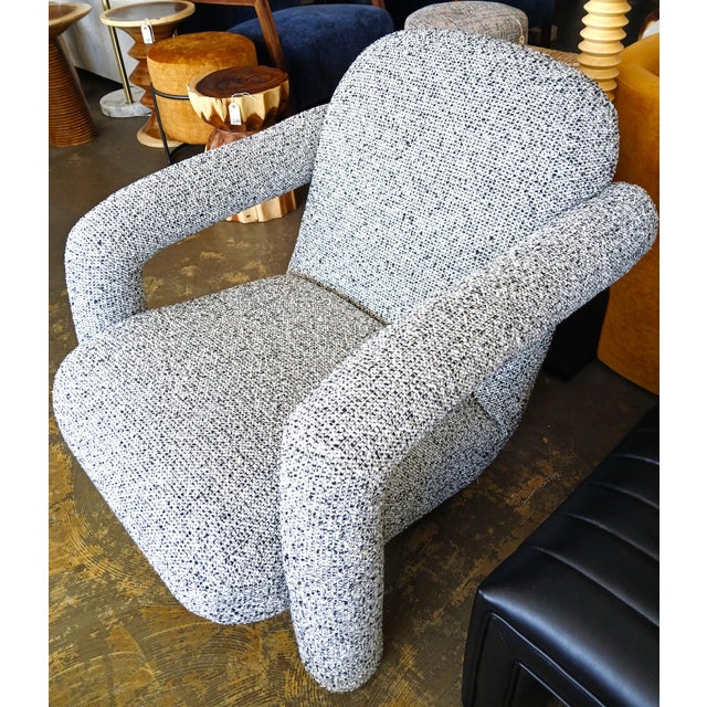 The Mavi Lounge chair is a great addition to any interior concept. Produced from a solid wood frame and upholstered in a...