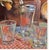 Rare, Art Deco Three-piece "Cocktails for Two" vintage shaker set. Shaker and glasses are in clear glass with red enamel...