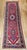 "This vibrant vintage Persian Heriz runner features a striking geometric composition with five axial medallions rendered...