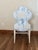 Elevate your space with this stunning Ambella Home scalloped accent chair, blending classic elegance with breezy coastal...