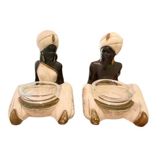1950s Mid-Century Chalkware Blackamoor Figurines & Ashtrays With Glass Inserts - A Pair For Sale