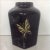 Offered is a Bob Mackie porcelain faceted vase in a black lacquered finish. This dainty vase would be beautiful holding a...