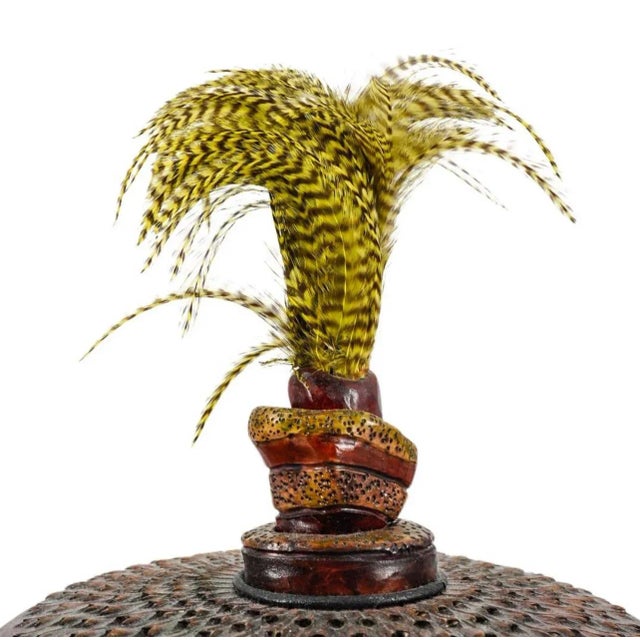 Signed Amy Grant Ceramic Lidded Pot embellished with a textured lid with central yellow and black striped feathers. Signed...