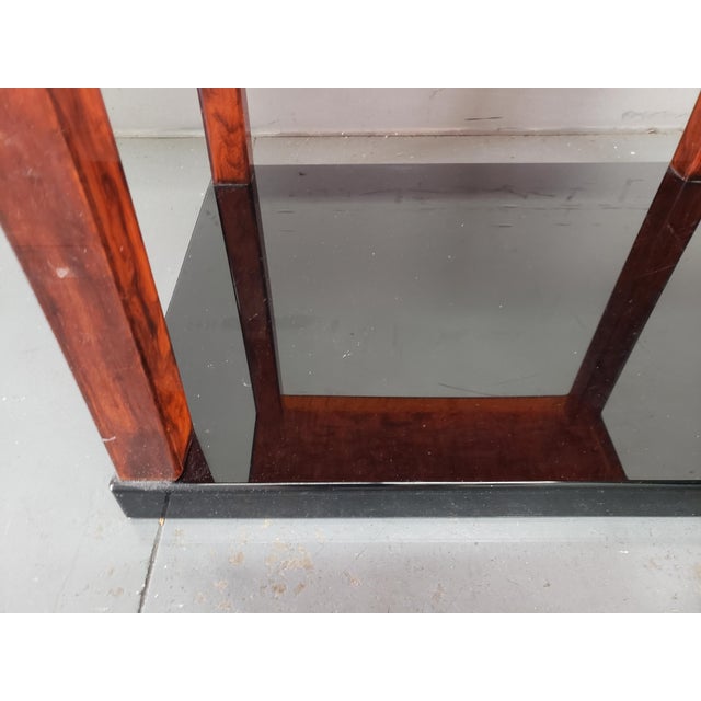 Custom (that means we designed this table and had it made locally) faux tortoise shell acrylic table set on a black...