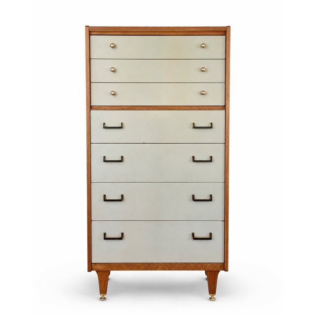 A distinctive g-plan e. Gomme mid-century tallboy chest of drawers, combining generous storage with elegant, space-saving...