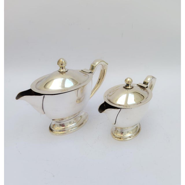 Pair of nickel silver teapots or sauceboats Art Krupp Berndorf, marked under the base Vintage, Art Deco, Giò Ponti era...