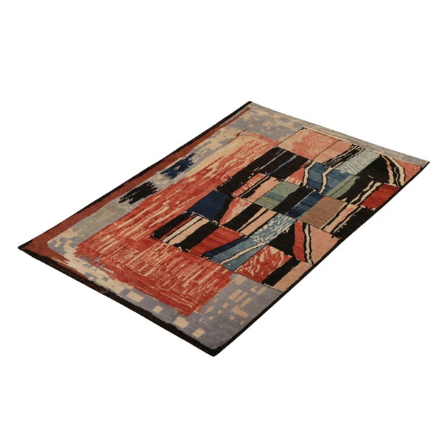 Hand knotted in wool originating from the works of Teddy Sumner circa 1990, this abstract rug employs an artisan approach...