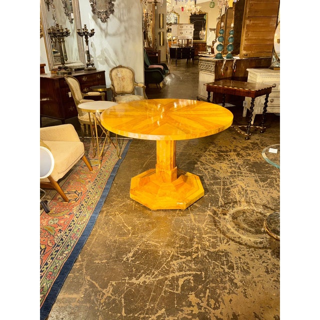 This Biedermeier Design Walnut Center Table is a beautifully crafted antique piece that exudes elegance and timeless...