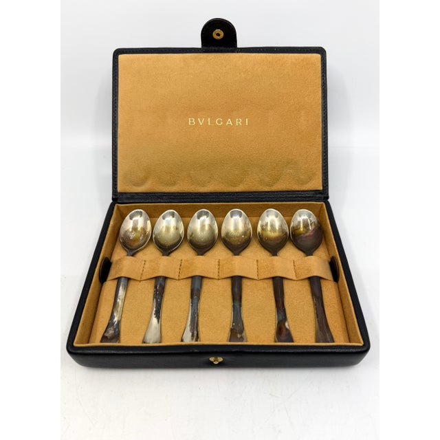 a nice set of 6 sterling silver spoons by Bulgari - Rosenthal in their original leather case. Each is marked Bulgari and...