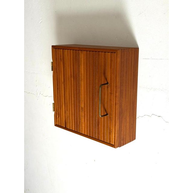 Trip Trap Teak Wall Cabinet – Denmark, 1960s A distinctive Danish teak wall cabinet by Trip Trap, dating from the 1960s ....