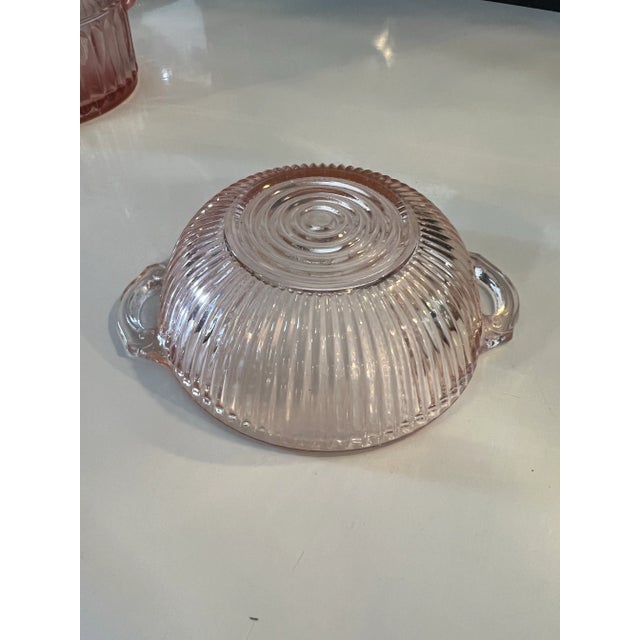 Pink depression glass bowl. Queen Mary By Anchor Hocking . Ribbed glass with double open handles. Measuring 5.75" by...