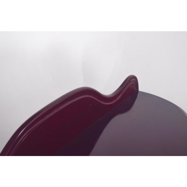 Romantic console in mahogany. The top has a wavy design, with a raised cut-out at the back, suggesting inspiration for...