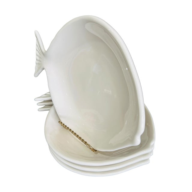 Elevate your next seaside gathering with this rare, retired set of four (4) Pottery Barn "Seashore" fish-shaped plates....