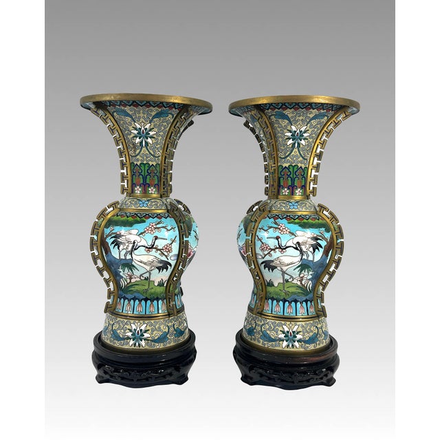 Extraordinary pair of Chinese Cloisonne beaker form vases. Graceful form with wide flaring 'trumpet' rim. Very heavy and...