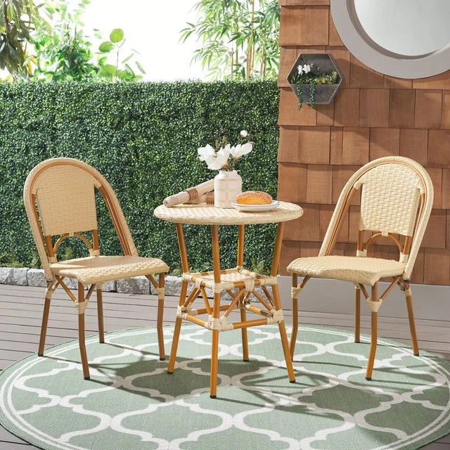 Elevate your alfresco fun with the inviting style and warmth of our California side chair. It updates the time-honored...