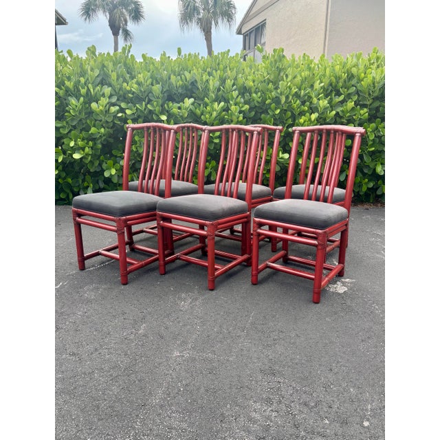 Striking set of six vintage dining chairs by McGuire, designed in the classic Chinese Official’s Hat chair form. Crafted...