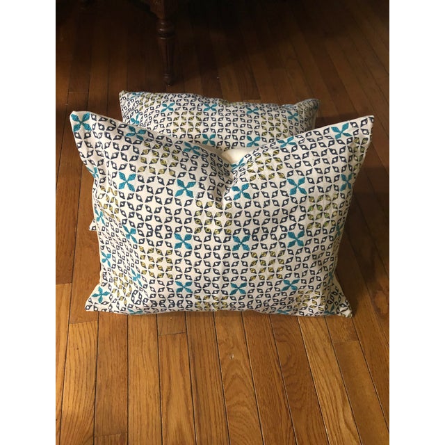 Beautiful colors with a little shimmering in the pattern add a little embroidery and you have this designer fabric by...