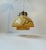 Elegant hanging pendant light composed of pastel/brown orange opaline glass shades decorated with marble effects. It...