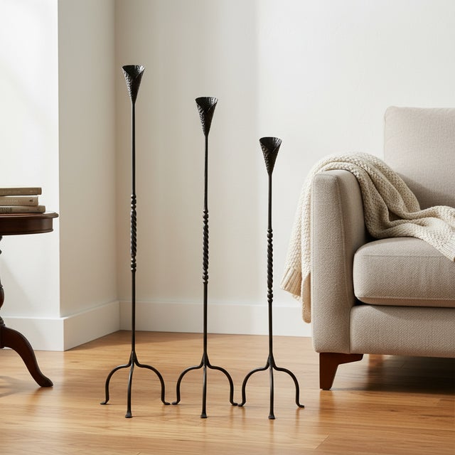 The Twisted Lily Trio: Floor Candelabra Set ️ Experience a beautiful fusion of organic shape and traditional...