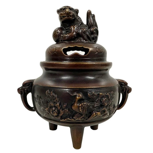 This magnificent Chinese Antique Carved Bronze incense burner has very detailed hand craft works around the body,...
