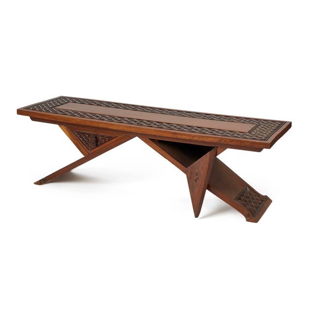 This vintage oak hand-carved wood coffee table with secret storage is a remarkable piece that combines both functionality...