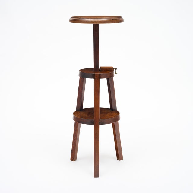 Charming late 19th-century French tripod pedestal crafted from solid walnut, circa 1890. The piece features three gently...