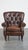 A beautiful, unique cognac-colored brown grained cowhide leather chesterfield armchair/armchair. This beautiful, classic,...