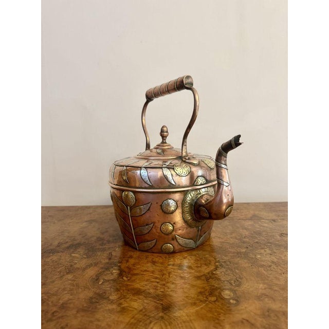 Unusual quality antique Dutch copper kettle, having an unusual quality antique Dutch copper kettle with pretty white metal...