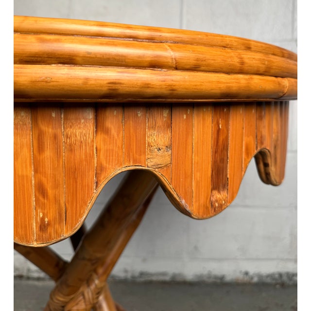 Add a touch of organic elegance to your space with this vintage bamboo table, a beautifully crafted piece that blends...