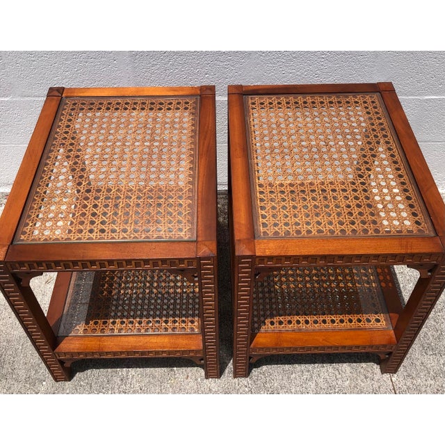 Beautiful pair of vintage mid century ornate cane and glass end tables. Circa 1970s. Made in the USA. Beautiful ornate...