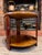 A quietly confident piece from the mid-century period, this circular coffee table combines Art Deco sensibility with the...