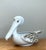 This charming vintage ceramic bowl features a whimsical yet sophisticated pelican form, capturing the breezy essence of...